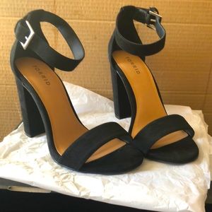 Rich faux suede Tapered heel.